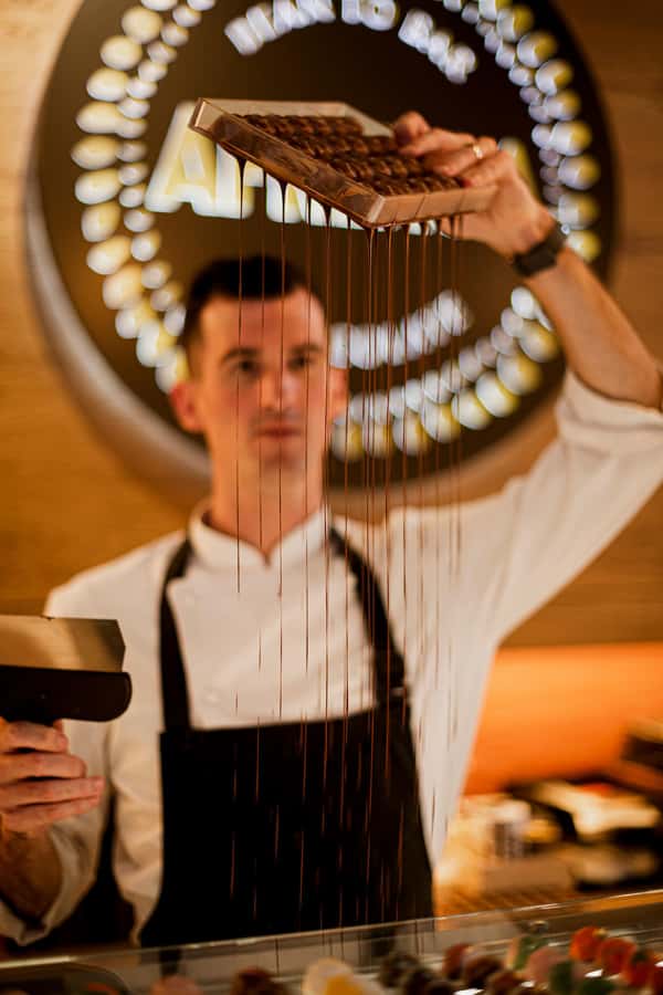 AFRIKOA Bean-to-Bar Chocolate Experience - Roasting, grinding, and refining the beans