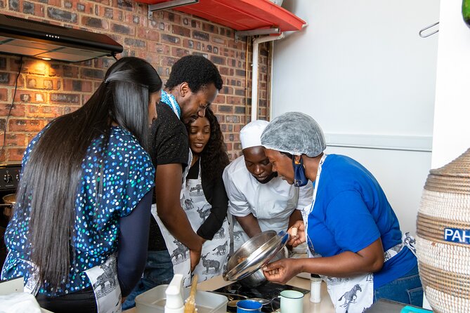 Authentic African Cuisine Cooking Experience - Cooking sadza, stews, greens, and beans