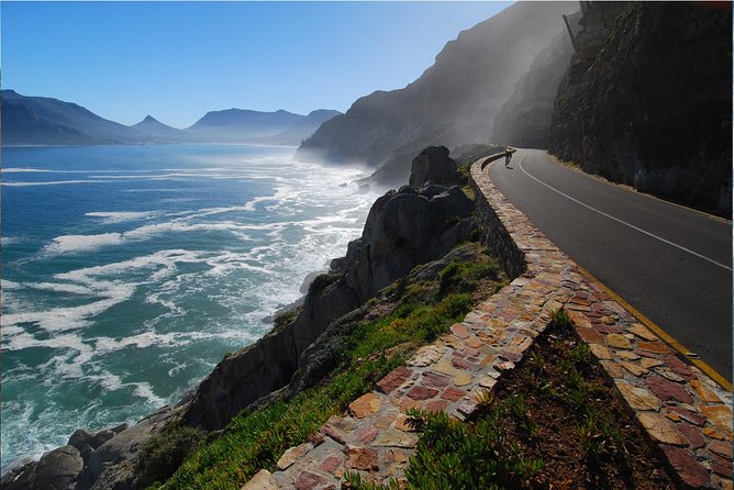 Cape Peninsula E-bike Cycle with Vehicle - Private Tour - Camps Bay begins the day beside the sea