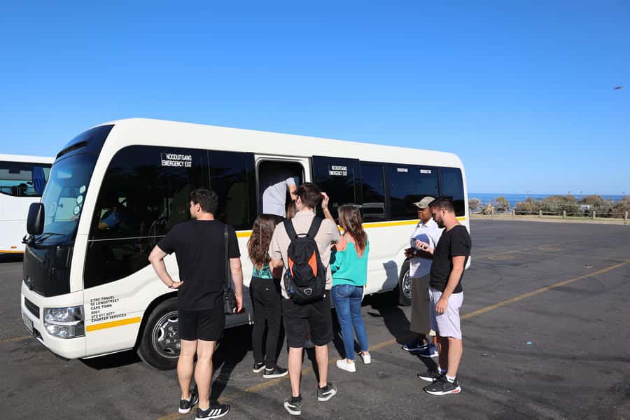 Cape Peninsula & Penguins Beach Half Day Tour from Cape Town - The return past Muizenberg Beach