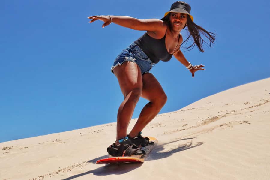 Cape Town: Guided Sand Boarding Experience at Atlantis Dunes - Riding the golden slopes at Atlantis Dunes