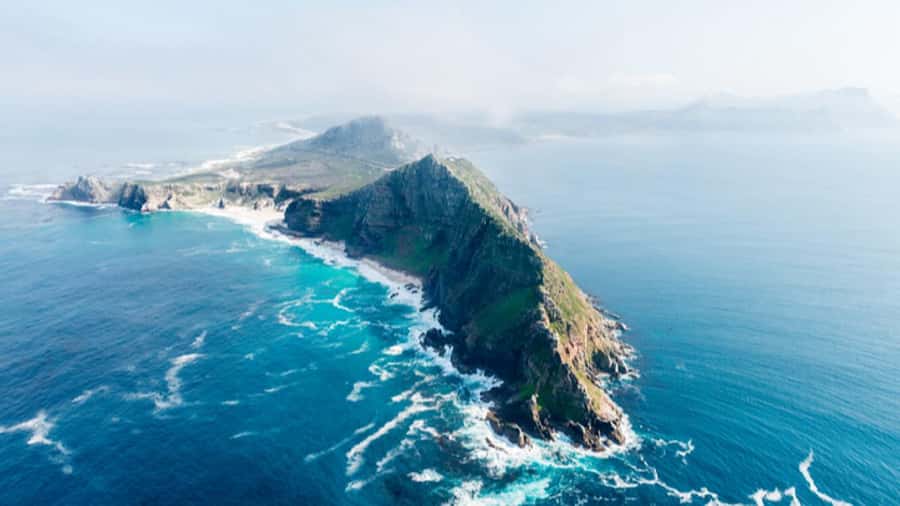Cape Town: Penguins & Cape of Good Hope Half Day Shared Tour - What the guide adds to the drive