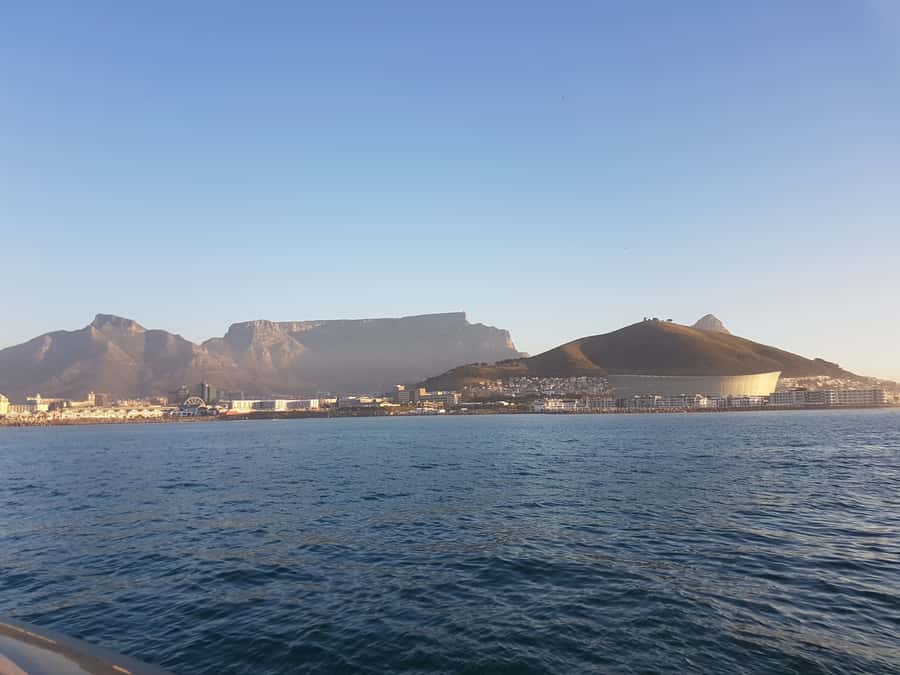 Cape Town: Sunset Cruise from V&A Waterfront with Bubbly - Returning with Cape Town lights behind you