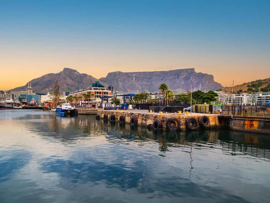 Cape Town Tour: Table Mountain, Penguins & Cape Point+Pickup - Muizenberg ends the day with color