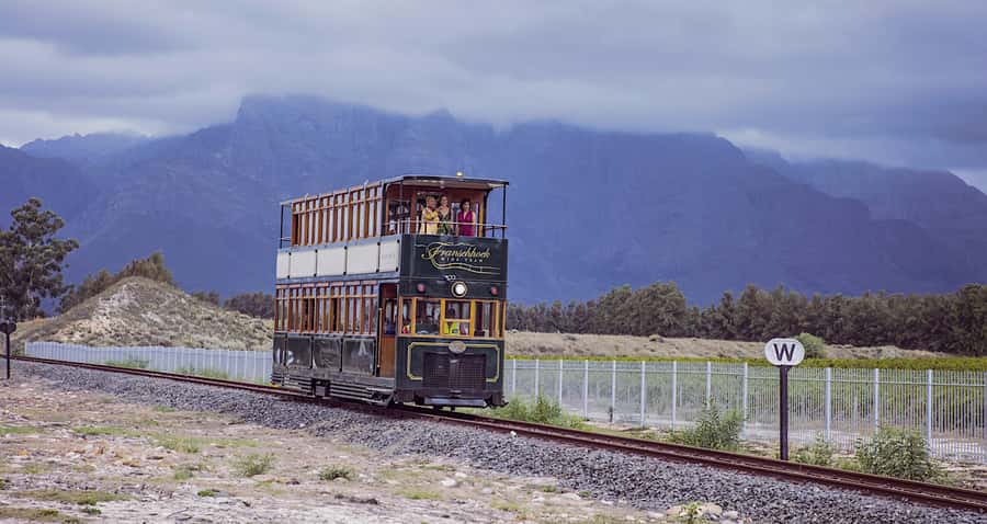 Cape Town: Wine Tram & Winelands Tour with Tastings & Pickup - From Cape Town to Stellenbosch by Helshoogte Pass