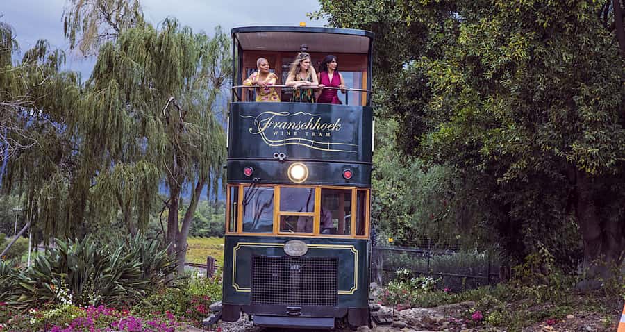 Cape Town: Wine Tram & Winelands Tour with Tastings & Pickup - Four estate tastings, with an important booking detail