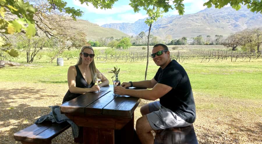 Franschhoek: E-Bike & Wine Tour (Shared Tour) - Riding through historic Franschhoek and its vineyards