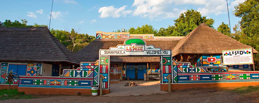 Johannesburg: Lesedi Cultural Village Experience - Traditional music, gumboot dancing, and the group gathering