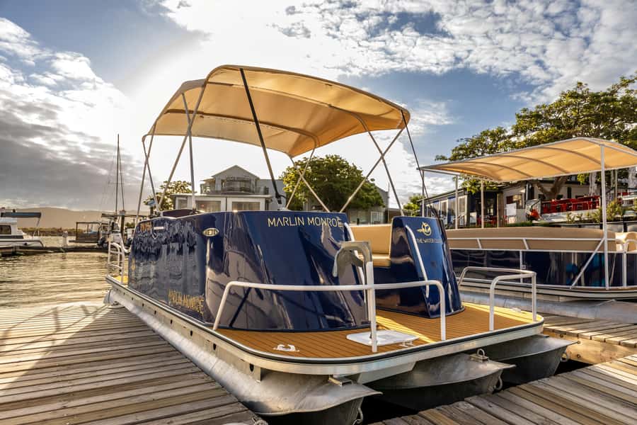 Knysna: Knysna Lagoon Pontoon Boat Cruise - Passing Thesen Islands with local commentary