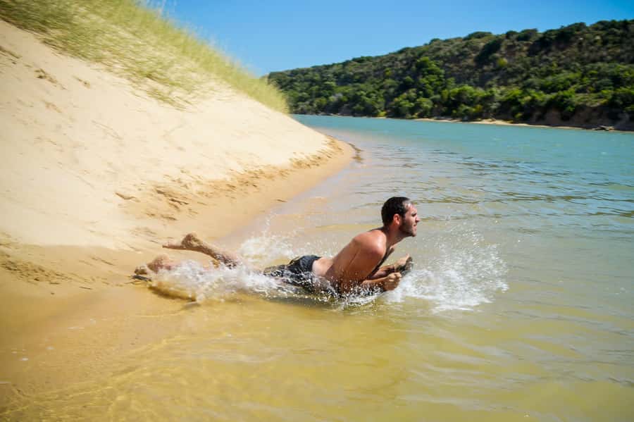 Port Elizabeth: Sandboarding with Short Boat Trip - A boat ride to the Alexandria dunes