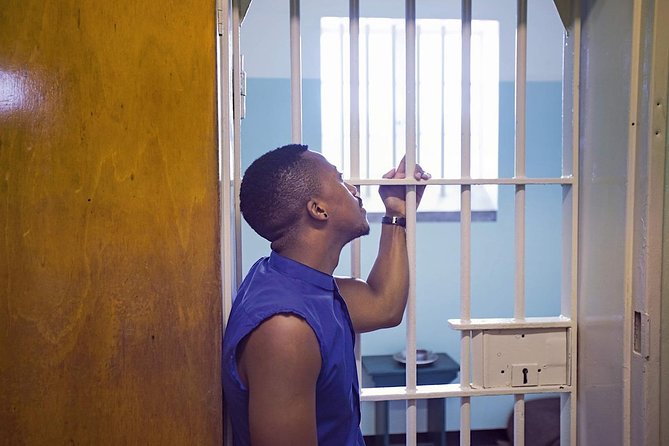 Robben Island Ferry Ticket and Guided Prison Tour - Meeting the former political prisoner