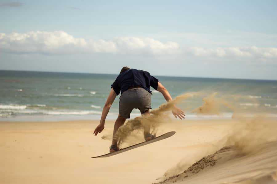 Sandboarding Jeffreys Bay - Standing Boards and Sit-Down Sledding
